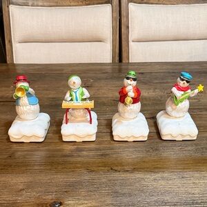 Hallmark Snowman Band Figurines that play music.  Set of 4